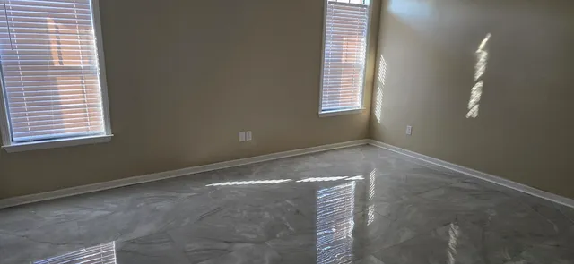 a bathroom with a shower and a sink