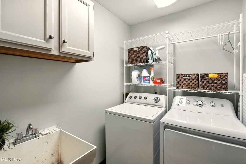 3339 Marsh Road Stow, OH 44224 - Photo 9 of 27 Laundry area with independent washer and dryer and cabinet space