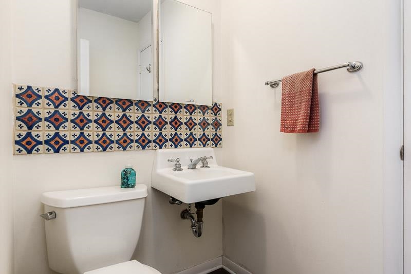 4902 Highcrest Road Rockford, IL 61107 - Photo 29 of 43 a bathroom with a sink toilet and mirror