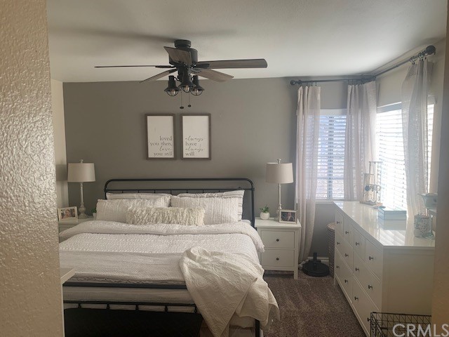 838 Live Oak Place Corona, CA 92882 - Photo 18 of 34 a bedroom with a bed and a window