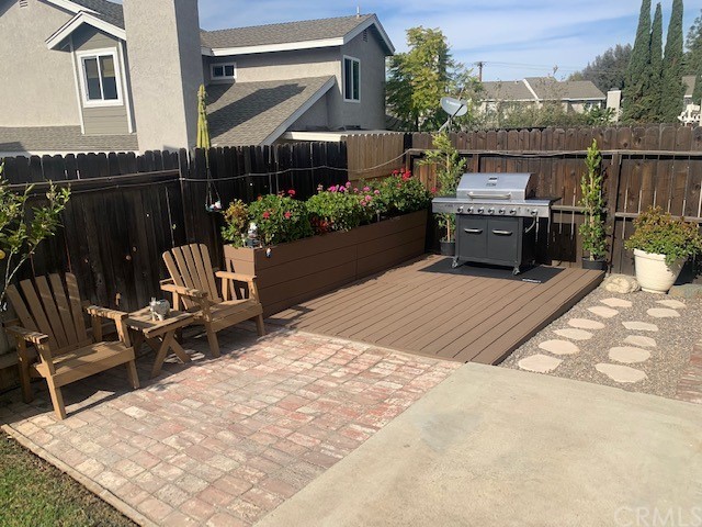 838 Live Oak Place Corona, CA 92882 - Photo 29 of 34 a view of a chairs and tables in the terrace