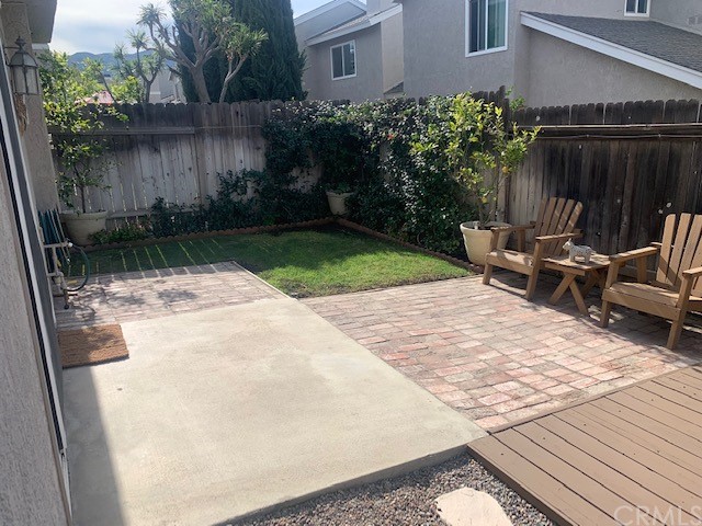 838 Live Oak Place Corona, CA 92882 - Photo 30 of 34 a view of backyard with a patio