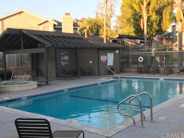838 Live Oak Place Corona, CA 92882 - Photo 33 of 34 a view of a swimming pool with a patio