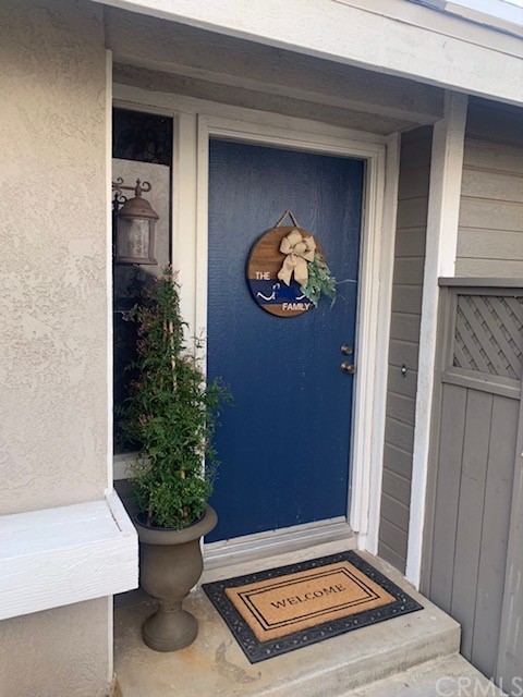 838 Live Oak Place Corona, CA 92882 - Photo 4 of 34 a view of an entryway door and wooden floor