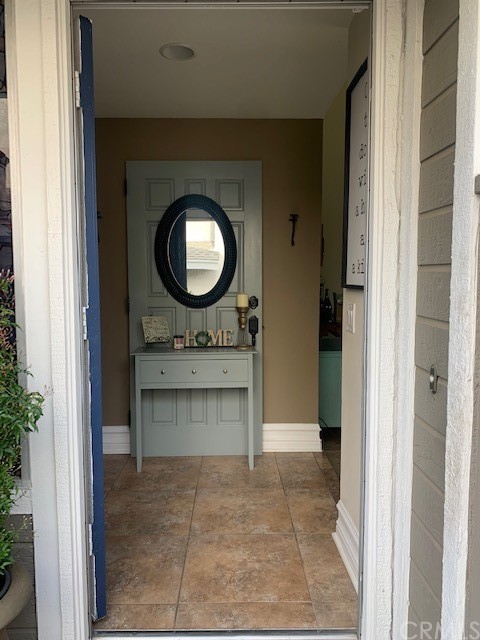 838 Live Oak Place Corona, CA 92882 - Photo 5 of 34 a bathroom with a sink and a mirror