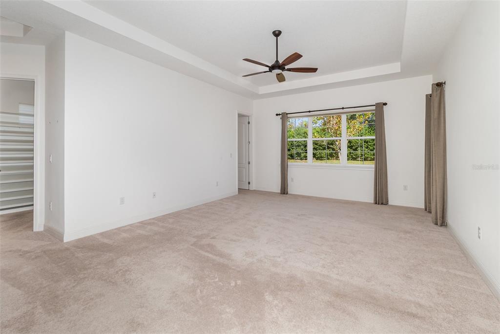4911 Drawdy Court St. Cloud, FL 34772 - Photo 12 of 37 a view of an empty room with a window