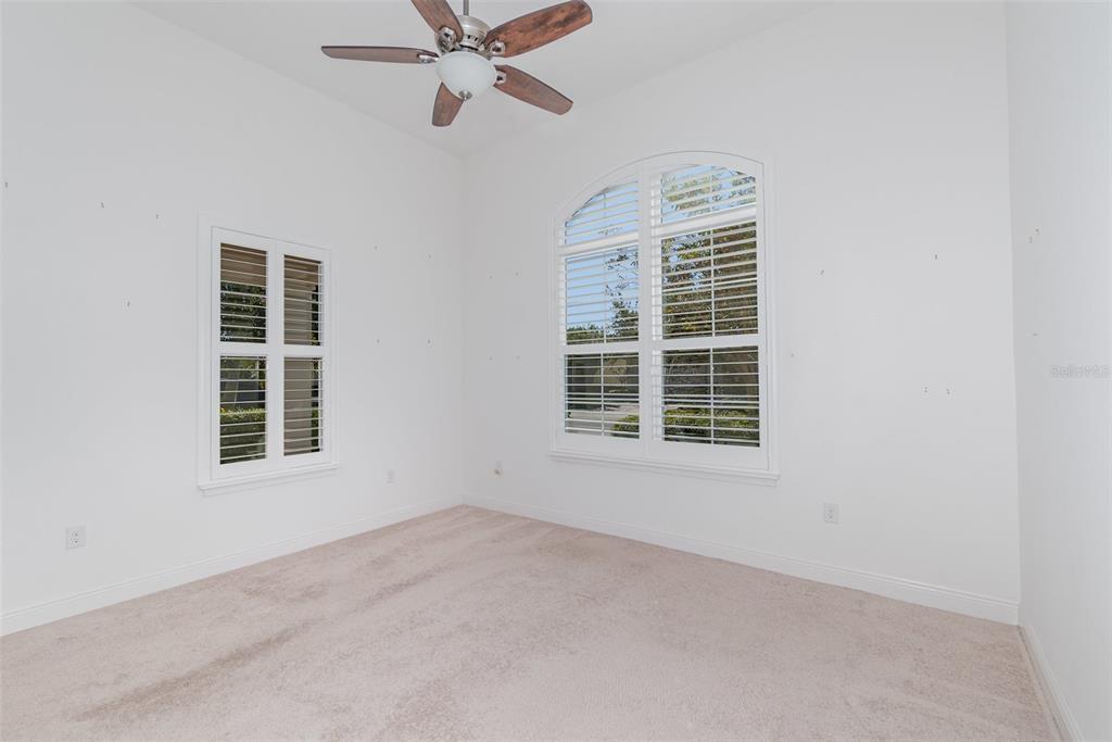 4911 Drawdy Court St. Cloud, FL 34772 - Photo 13 of 37 a view of an empty room with a window