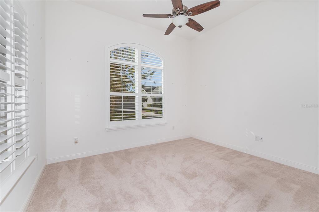 4911 Drawdy Court St. Cloud, FL 34772 - Photo 14 of 37 a view of an empty room with a window