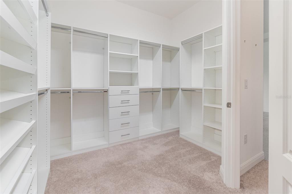 4911 Drawdy Court St. Cloud, FL 34772 - Photo 17 of 37 a view of an empty walk in closet