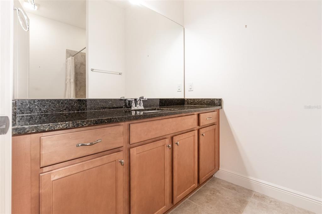 4911 Drawdy Court St. Cloud, FL 34772 - Photo 29 of 37 a close view of sink and tap