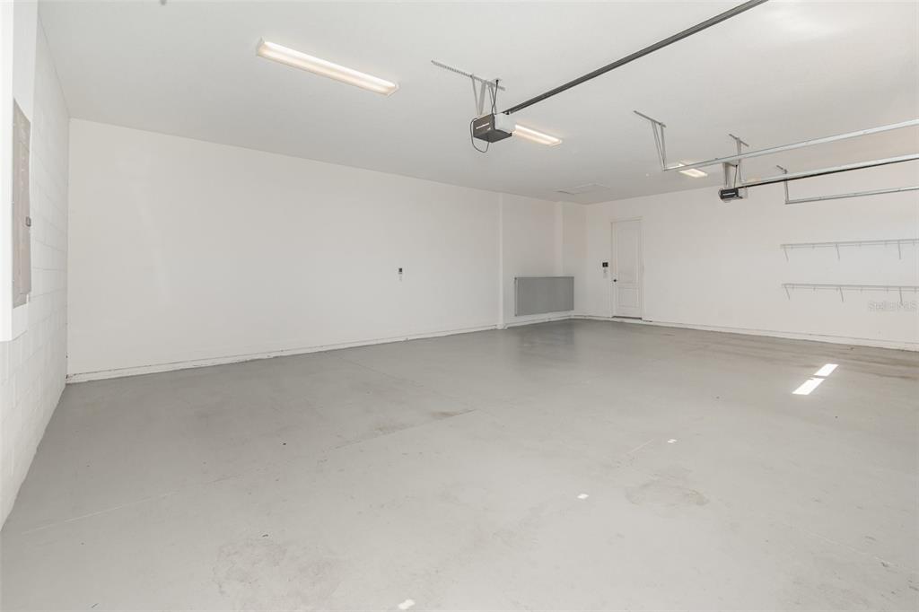 4911 Drawdy Court St. Cloud, FL 34772 - Photo 31 of 37 an empty room with a ceiling fan and window