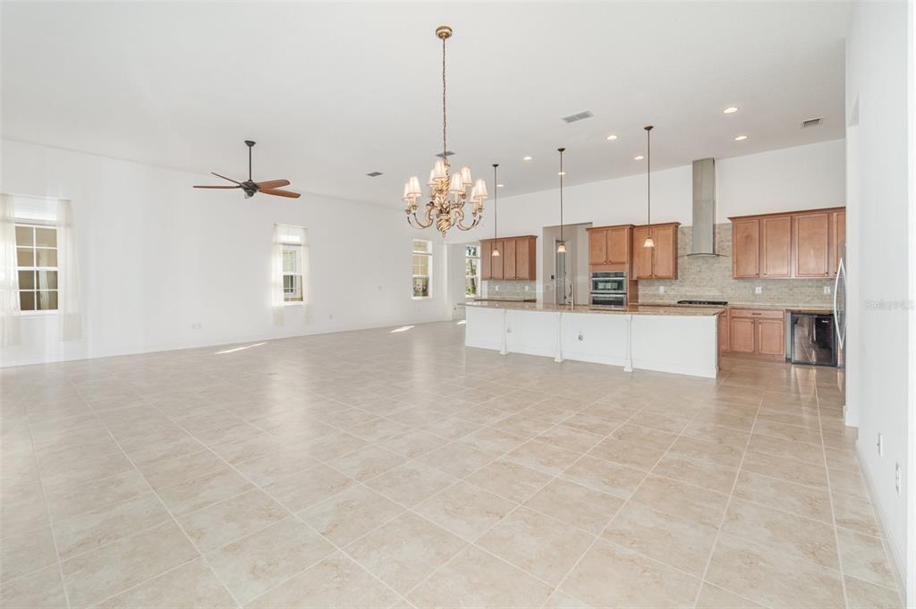 4911 Drawdy Court St. Cloud, FL 34772 - Photo 5 of 37 a view of a kitchen with a sink and cabinets