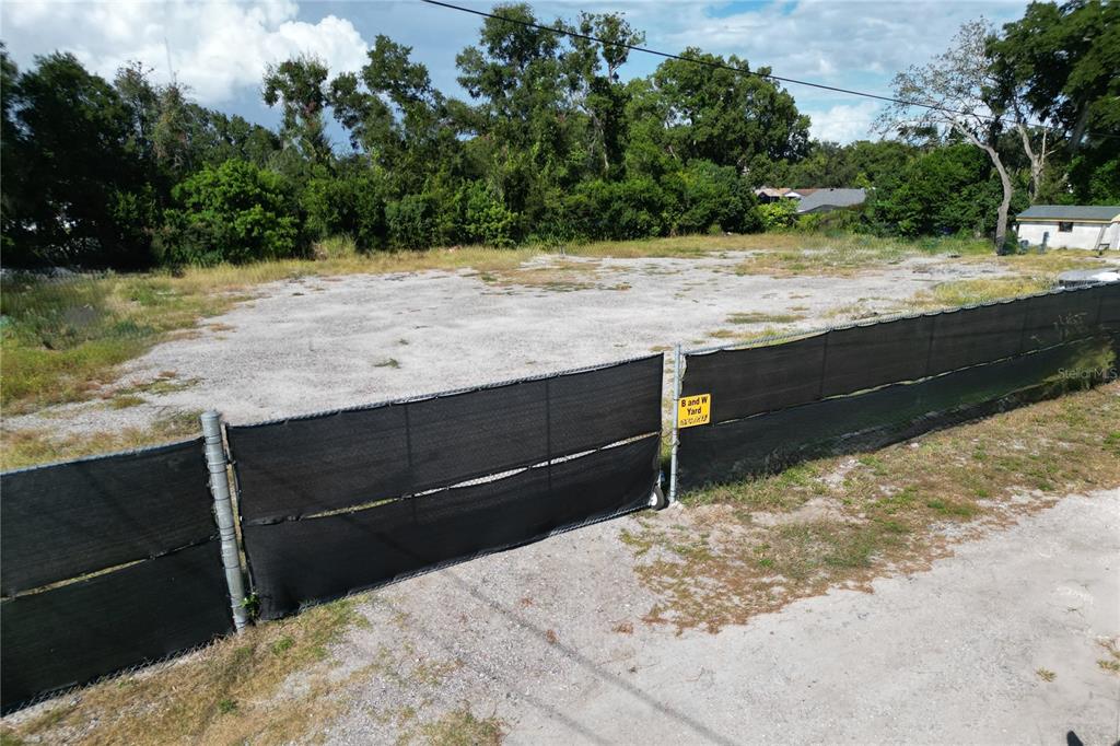 a view of a backyard of the house