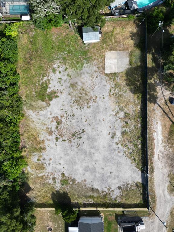 4155 Pine Haven Road New Port Richey, FL 34653 - Photo 10 of 12 a view of swimming pool with a yard