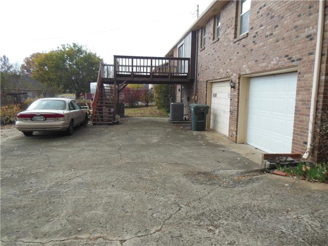 2403 Hickory Drive Springfield, TN 37172 - Photo 2 of 16 Back view of home showing 2 car garage, lots of parking space, deck, and covered patio!