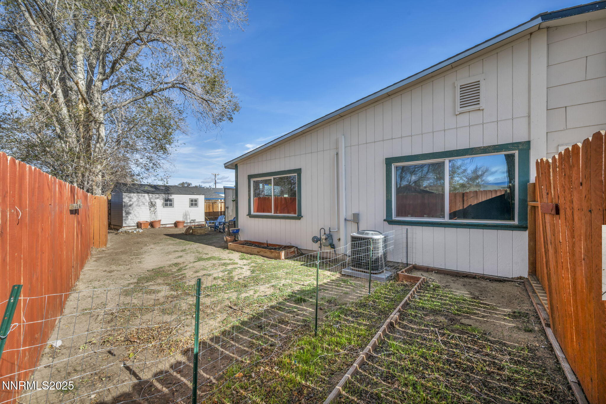 13623 Mt Baldy Street Reno, NV 89506 - Photo 13 of 46 a front view of a house with garden