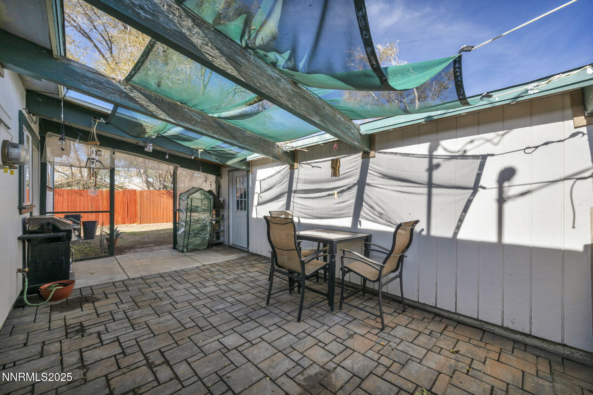 13623 Mt Baldy Street Reno, NV 89506 - Photo 14 of 46 a view of a chairs and table in the patio