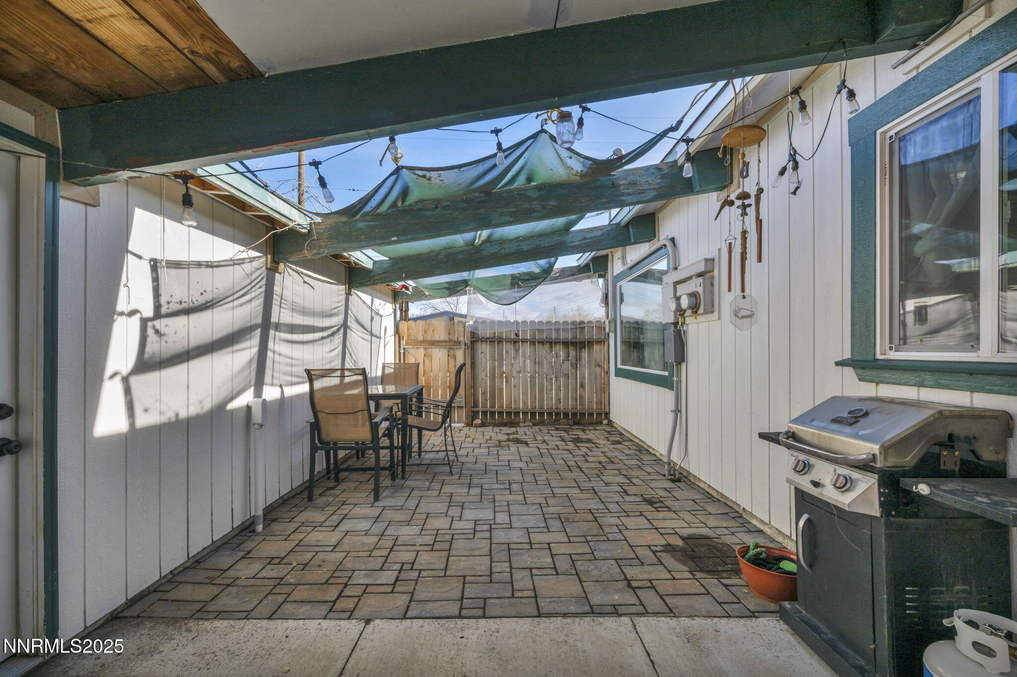 13623 Mt Baldy Street Reno, NV 89506 - Photo 18 of 46 a view of a chairs and table in the patio