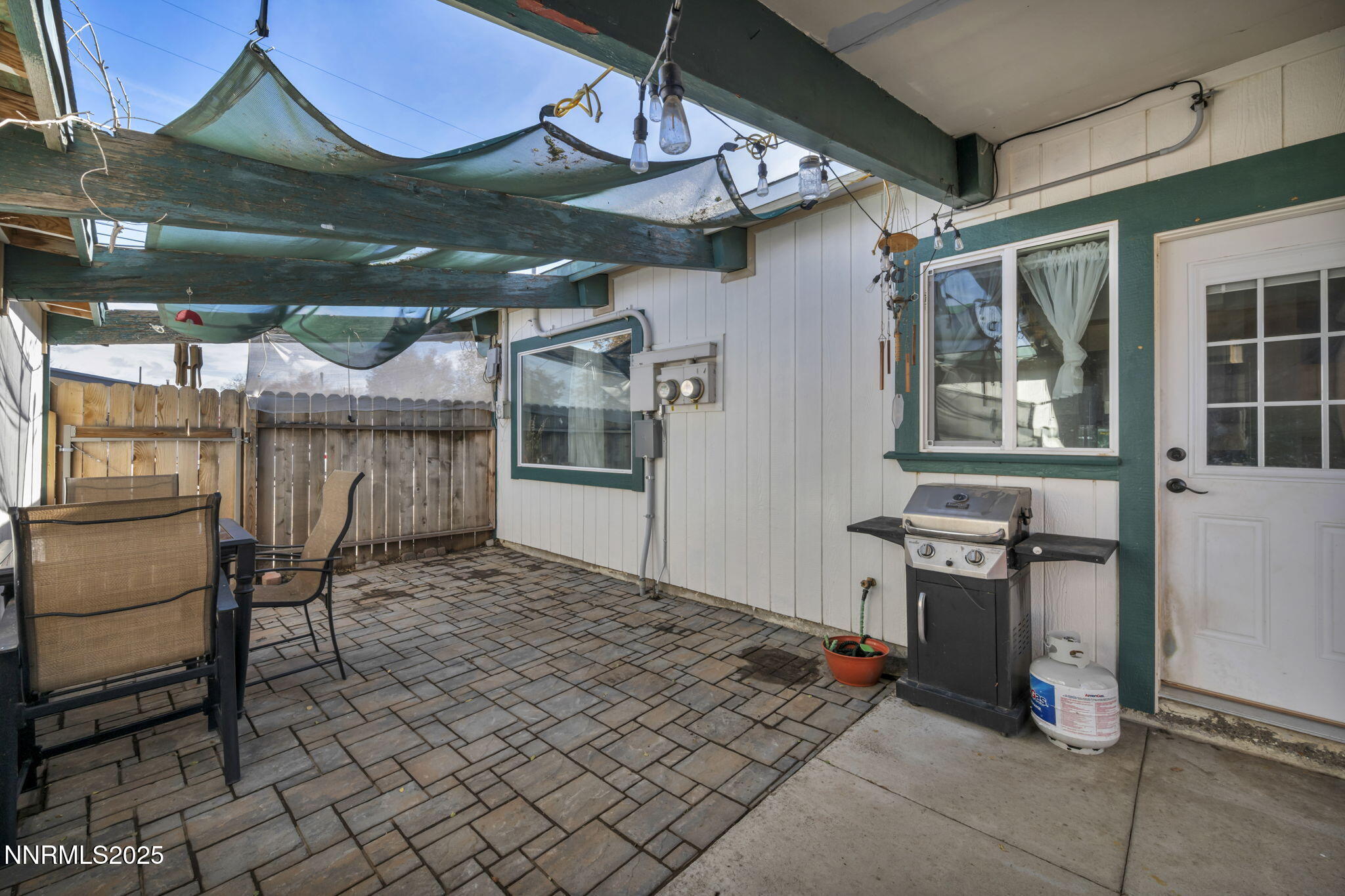 13623 Mt Baldy Street Reno, NV 89506 - Photo 19 of 46 a view of a chairs and table in the patio