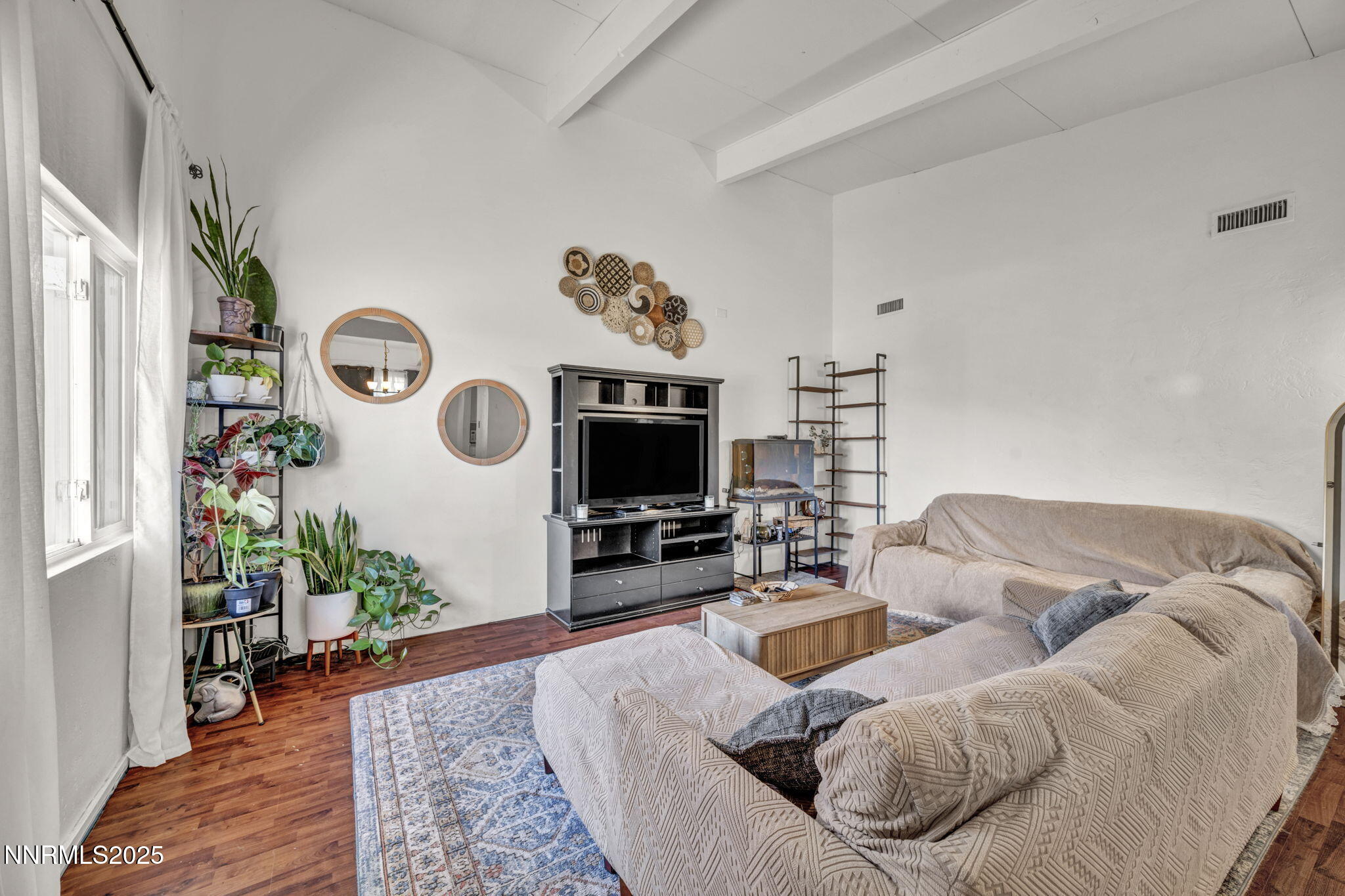 13623 Mt Baldy Street Reno, NV 89506 - Photo 22 of 46 a living room with furniture and a flat screen tv