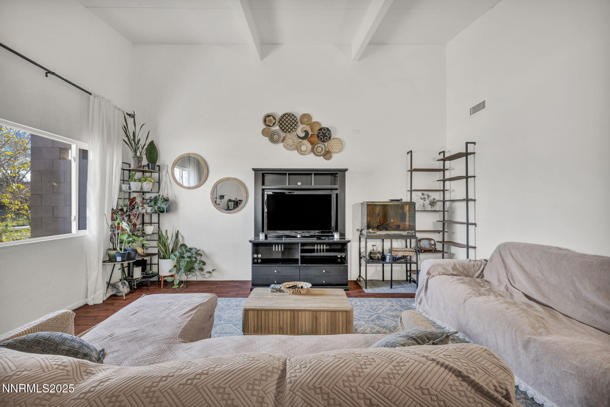 13623 Mt Baldy Street Reno, NV 89506 - Photo 23 of 46 a living room with furniture and a flat screen tv