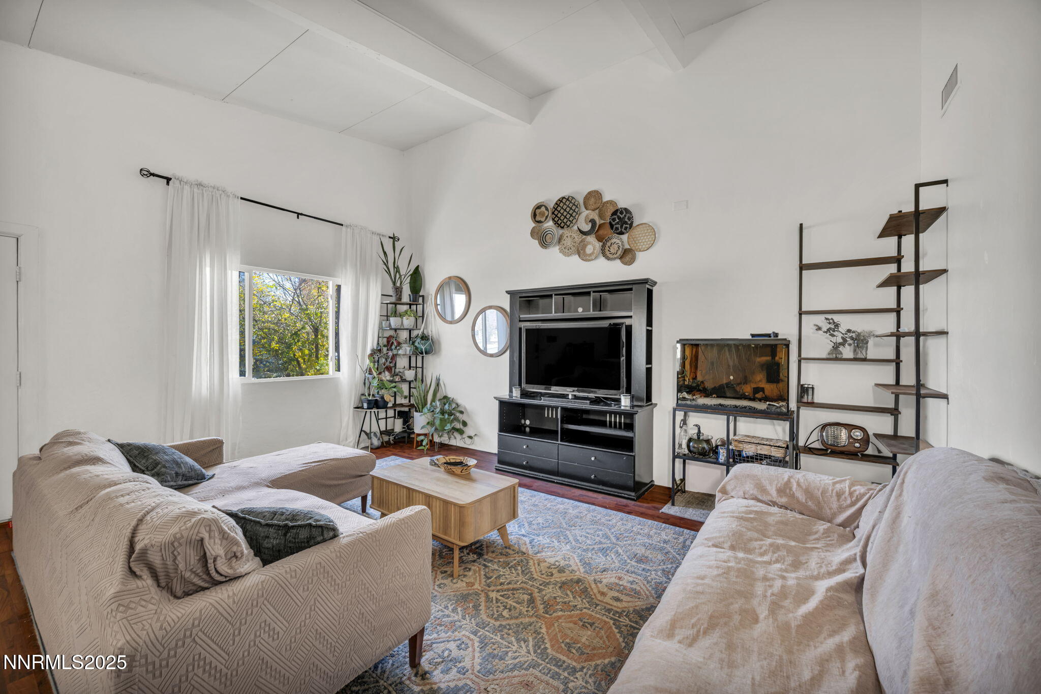 13623 Mt Baldy Street Reno, NV 89506 - Photo 24 of 46 a living room with furniture and a flat screen tv