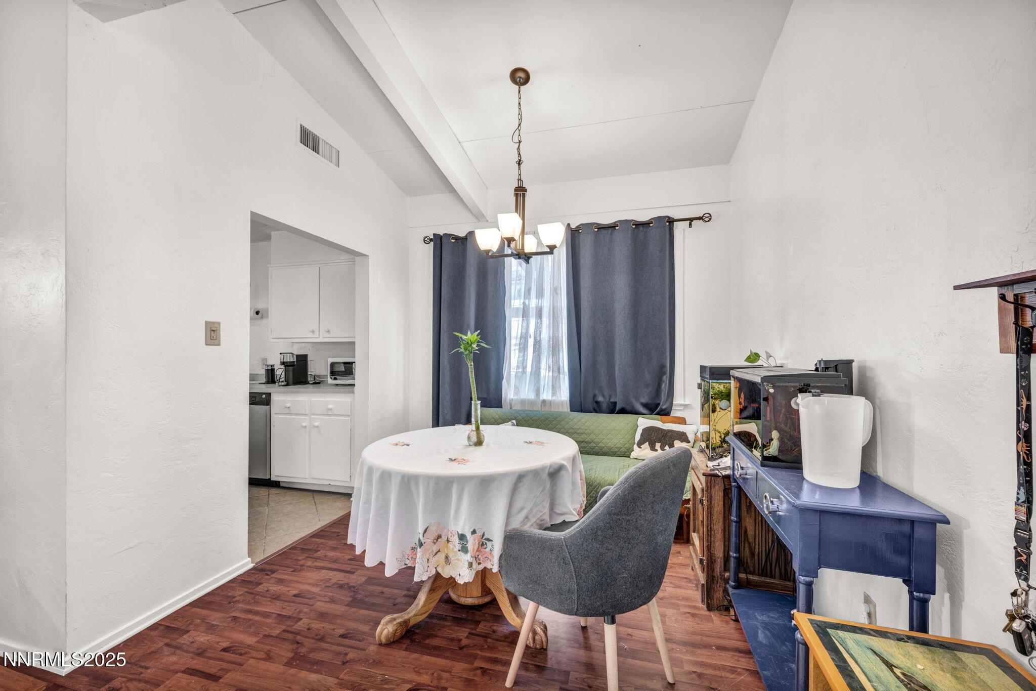 13623 Mt Baldy Street Reno, NV 89506 - Photo 29 of 46 a view of a dining room with furniture window and wooden floor
