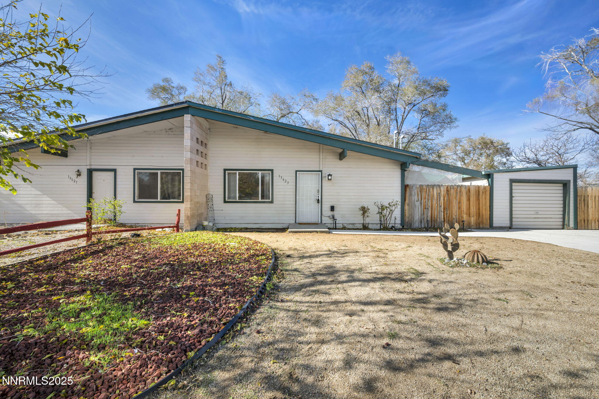 13623 Mt Baldy Street Reno, NV 89506 - Photo 3 of 46 a house with trees in front of it