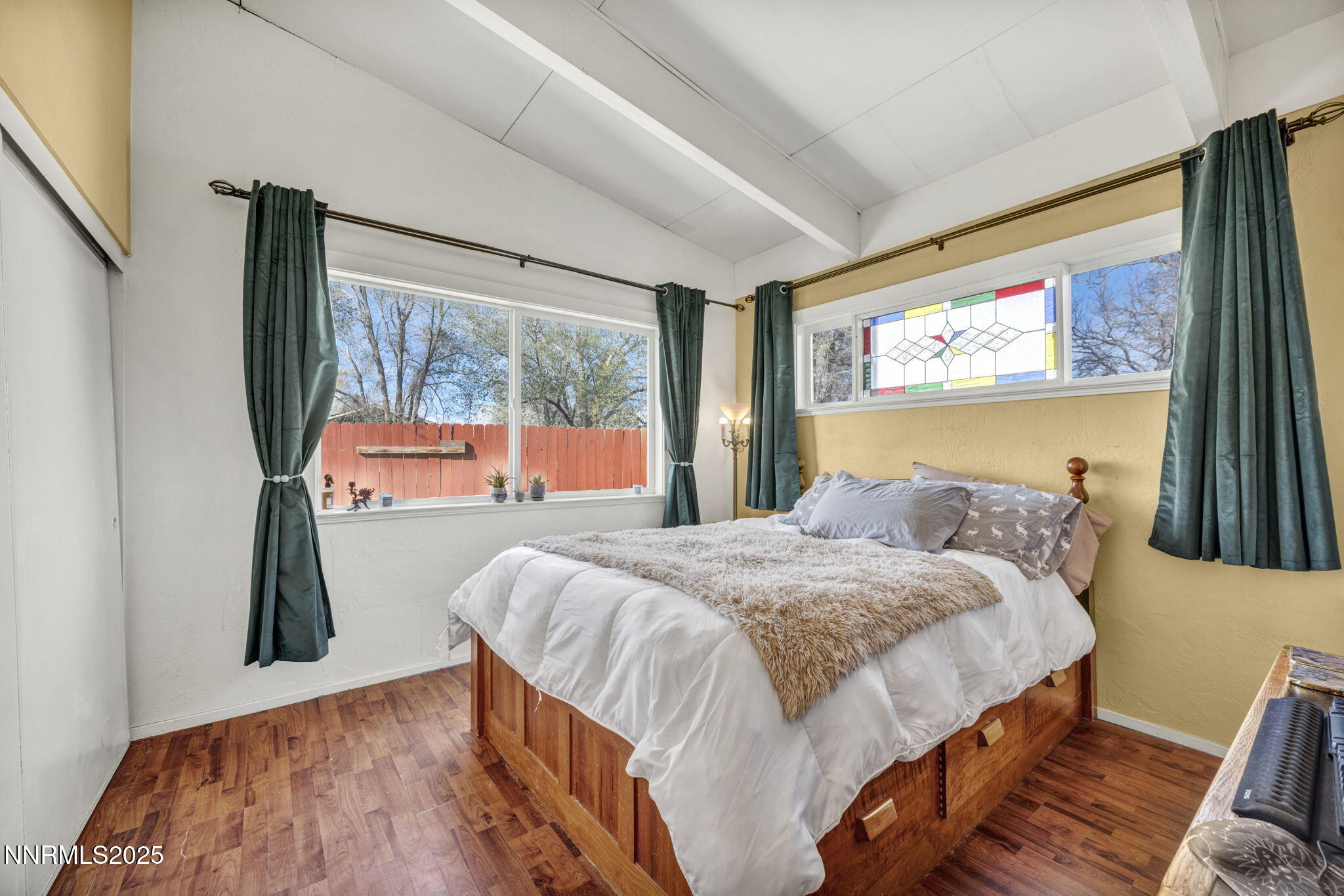 13623 Mt Baldy Street Reno, NV 89506 - Photo 39 of 46 a bedroom with a bed and glass door