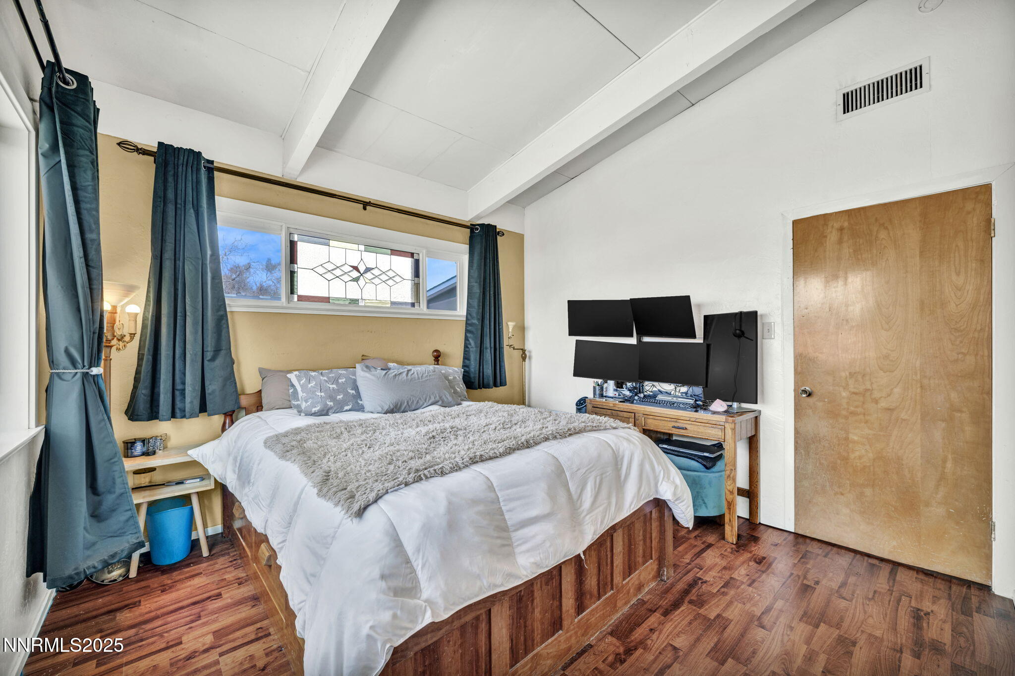 13623 Mt Baldy Street Reno, NV 89506 - Photo 40 of 46 a bedroom with a bed and a flat screen tv