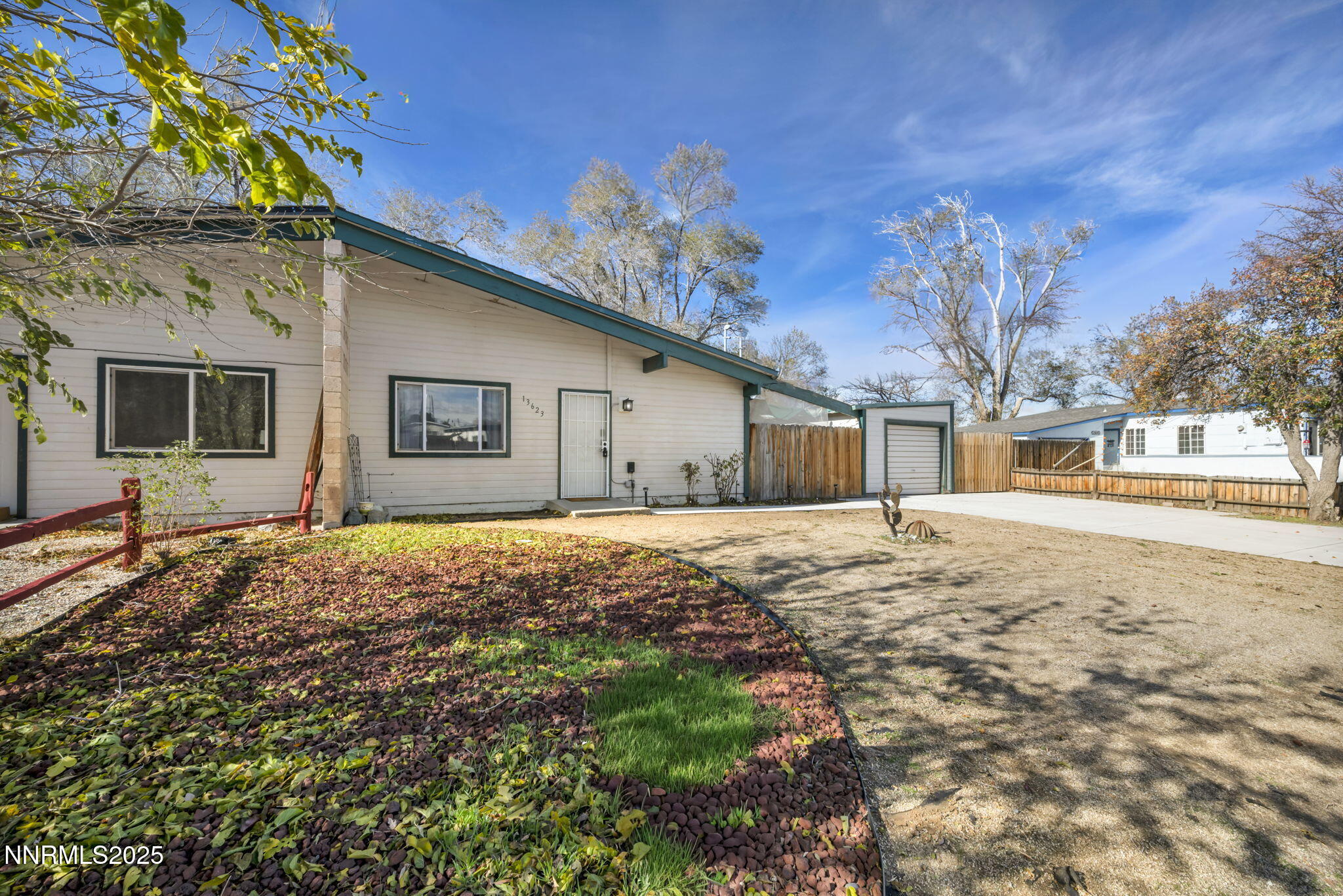 13623 Mt Baldy Street Reno, NV 89506 - Photo 4 of 46 a view of a house with a yard