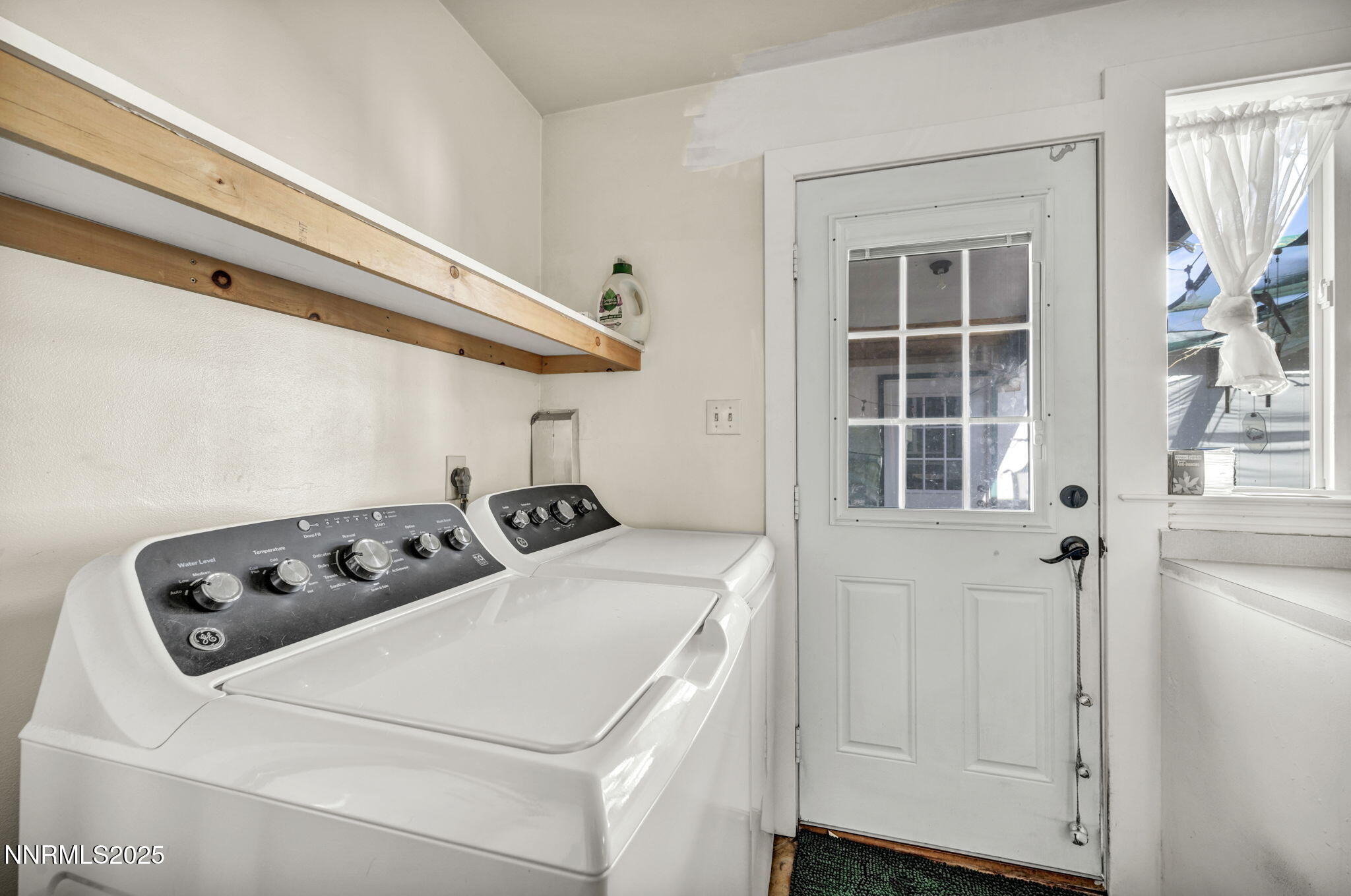 13623 Mt Baldy Street Reno, NV 89506 - Photo 44 of 46 a utility room with dryer and washer