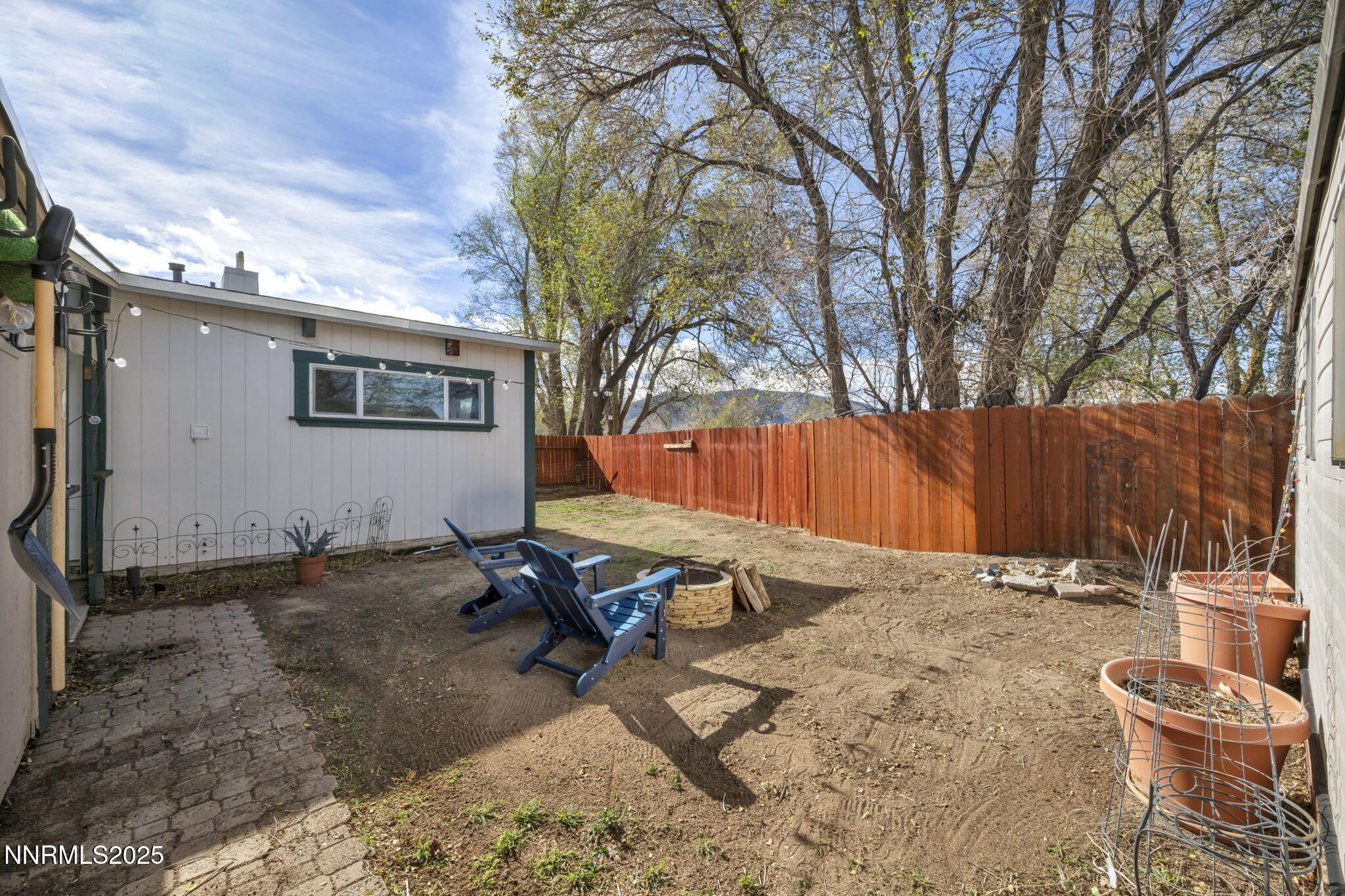 13623 Mt Baldy Street Reno, NV 89506 - Photo 9 of 46 a backyard of a house with table and chairs