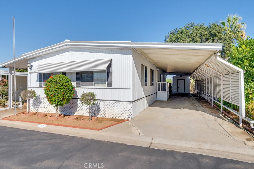 3500 Buchanan Street, Unit 73 Riverside, CA 92503 - Photo 2 of 30 a view of a house with a garage