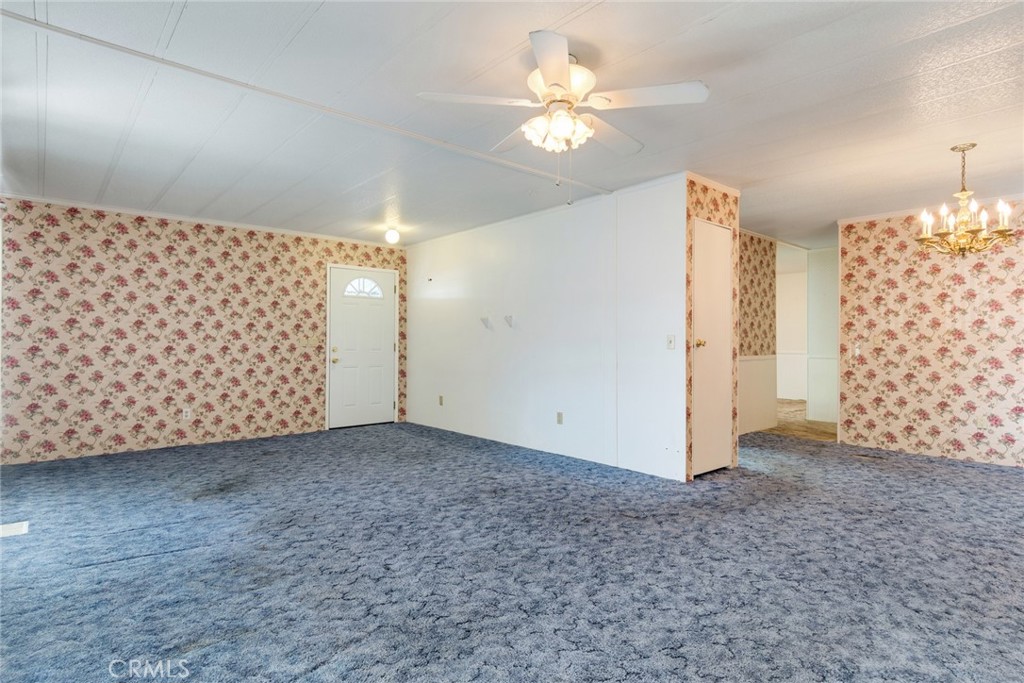 3500 Buchanan Street, Unit 73 Riverside, CA 92503 - Photo 4 of 30 a view of a livingroom with a chandelier fan