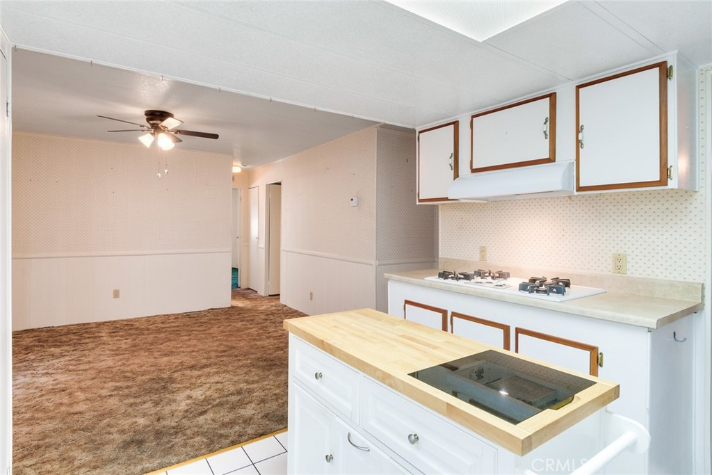 3500 Buchanan Street, Unit 73 Riverside, CA 92503 - Photo 8 of 30 a kitchen with a stove and a sink