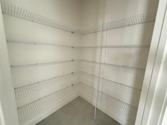 a view of kitchen with furniture and window