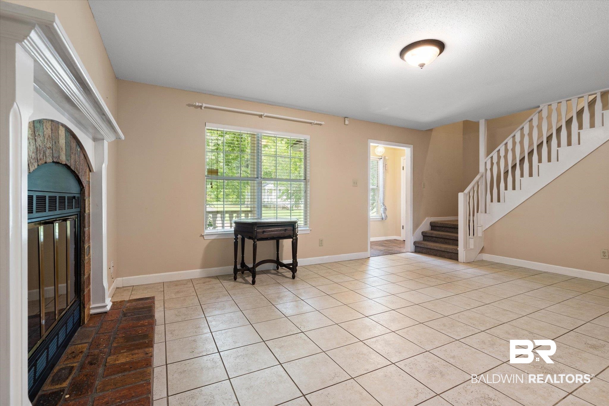 6632 Autumn Ridge Drive Mobile, AL 36695 - Photo 3 of 22 Foyer entrance featuring stairs, light tile flooring