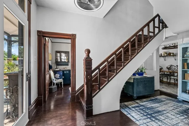 a kitchen with a sink and a refrigerator