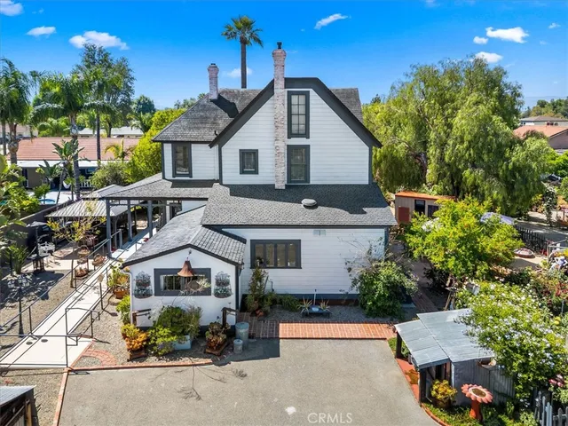 a view of a livingroom with furniture and a chandelier