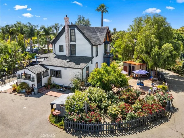 a room with furniture a window and wooden floor