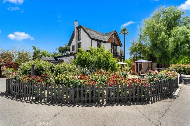 a outdoor dining space with furniture and a window