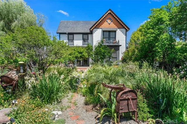 front view of a house with a small yard