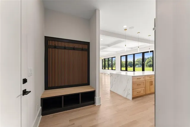 a view of a livingroom with a fireplace a swimming pool and outdoor space