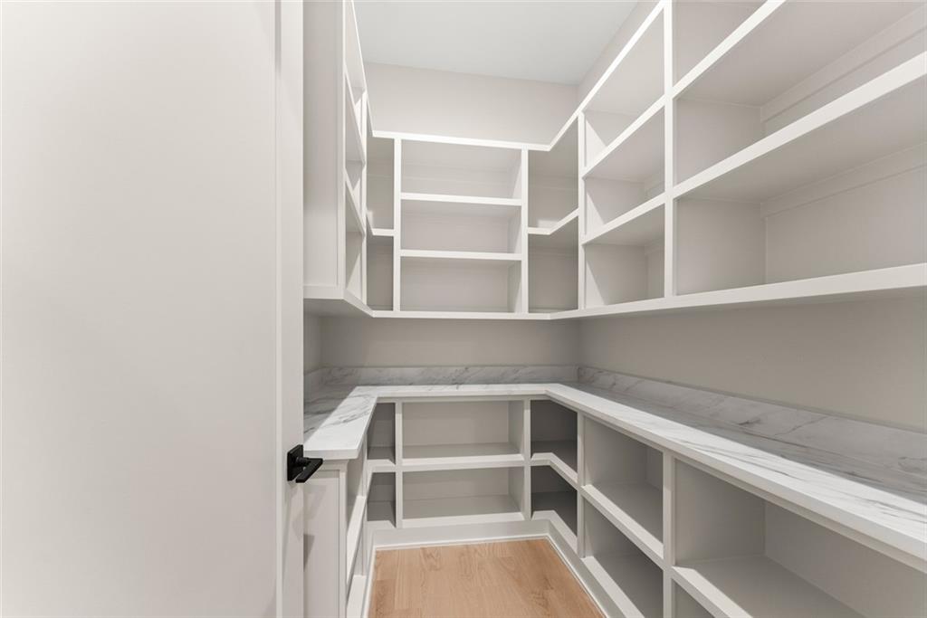 2031 Jones Phillips Road Dacula, GA 30019 - Photo 25 of 89 a view of walk in closet with empty racks