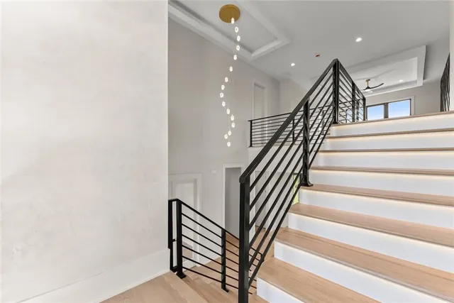 a view of a lake with a house in the background