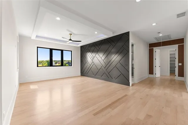 a front view of a house with a swimming pool