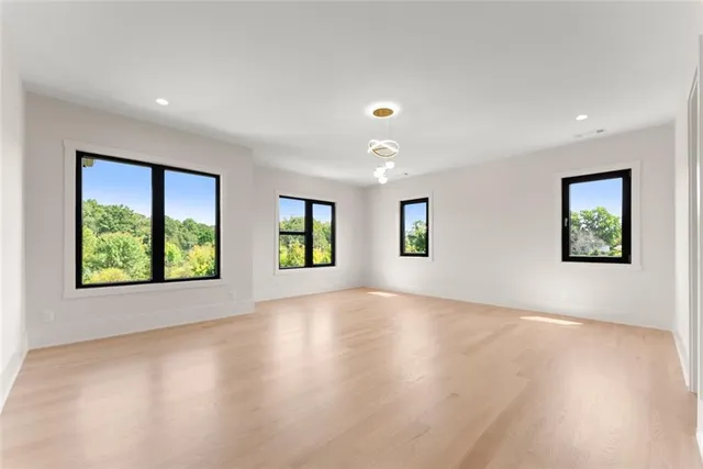 a view of a swimming pool with a lake view