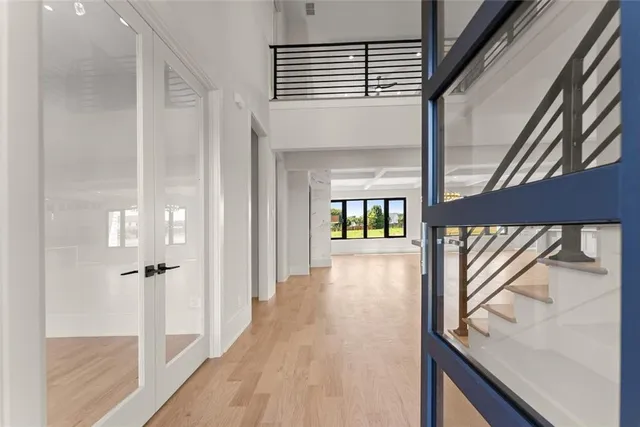 a kitchen with stainless steel appliances a sink stove and refrigerator