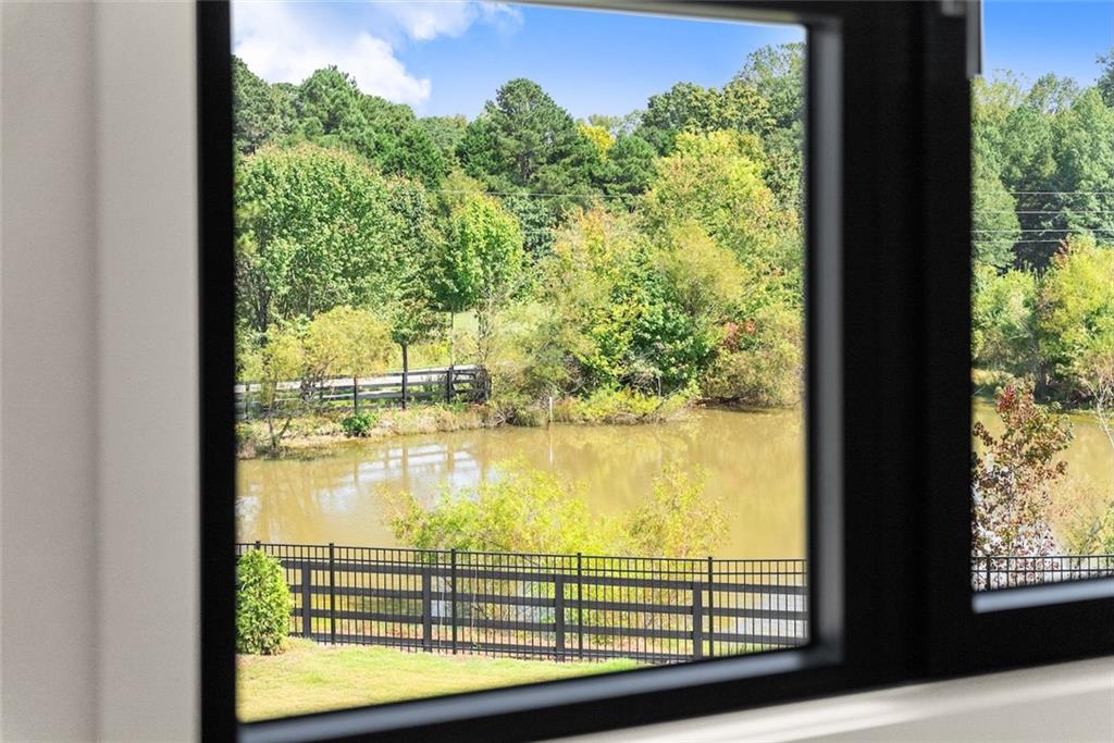 2031 Jones Phillips Road Dacula, GA 30019 - Photo 64 of 89 a view of a lake from a window